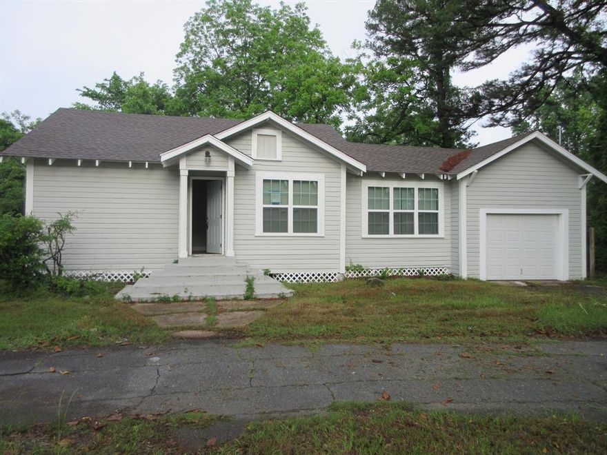 Nicely remodeled home with 2 bedrooms and 2 full baths. Large living room and nice size kitchen. New flooring throughout. New kitchen appliances. New hot water heater. Has a room for an office or could be used as a 3rd bedroom. 1 car attached garage. Large lot. AGENTS: see agent remarks.