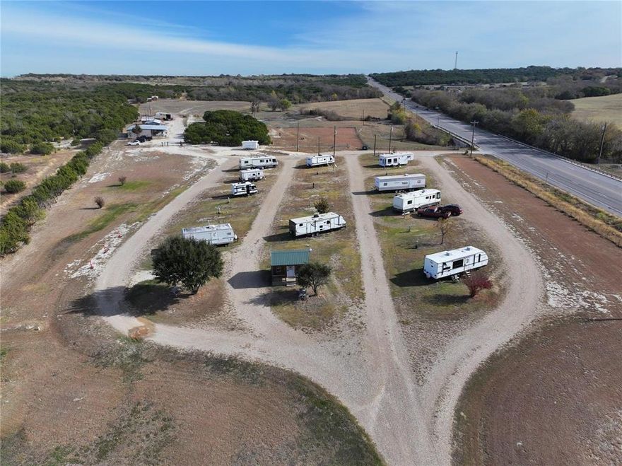 NEW PRICE!  Fantastic Investment Property with US Hwy 67 Frontage as well as entrance from CR 308.   14.37 Acres in Somervell County set up as an RV Park with 30 sites available with both 30 and 50 amp RVs.  There is also an 1800 sf home set up as Main Residence.   Conveniently located between Cleburne and Glen Rose, and minutes to the Brazos River with Canoe and Rafting Rentals. RV Park does have Rules in place for age and aesthetics on RVs, as well as guest etiquette.  Adjoining Acreage also available with small cabin for expansion.  Unlimited Potential and Growth Opportunity
Investors Welcome