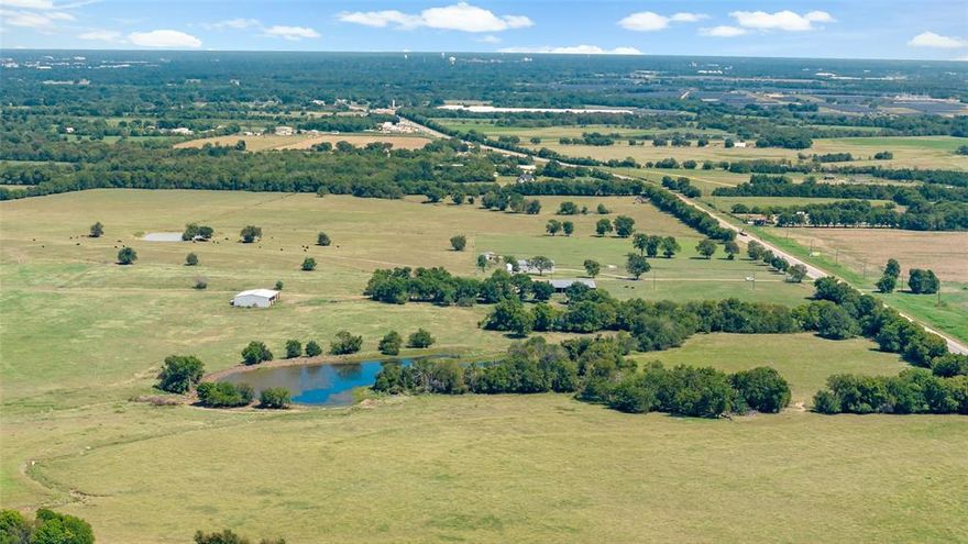 Welcome to a breathtaking 516-acre ranch ideally located off Highway 82 in western Lamar County, Texas. This expansive property offers a rare opportunity to own a large-scale investment in a region where ranches of this size and quality are increasingly hard to find. The land includes 13 stock ponds, 12 pastures, a hay barn, a shop, and a full set of livestock pens—making it a turnkey setup for ranching, farming, or recreational use. A well-equipped horse barn adds to the appeal for equestrian enthusiasts. The charming 2-bedroom, 2-bathroom home features a versatile bonus area upstairs, perfect for guests, hobbies, or a home office. The back porch overlooks the pastures, offering a peaceful spot to enjoy quiet mornings or unwind in the evening.

 Property Features
•   Located on Highway 82 in western Lamar County, TX
•   516 acres of ag-exempt ranch land
•   2-bedroom, 2-bathroom barndo
•   Bonus area upstairs
•   Back porch with views of the pastures

Ranch Improvements
•   13 stock ponds
•   12 pastures
•   Horse barn
•   Hay barn
•   Shop building
•  Full set of livestock pens

 Disclaimer: All information provided herein was acquired from sources deemed reliable and is believed to be accurate. However, we do not warrant its accuracy or completeness and recommend that every item of interest be independently verified by Purchaser.