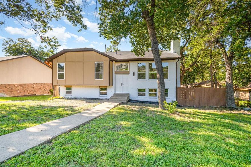 Completely remodeled 3-bedroom, 2-bath home in Dallas! This home features an open-concept layout with fresh paint, new luxury flooring, and updated lighting throughout. The chef’s kitchen includes quartz countertops, new cabinets, stainless steel appliances, and a spacious island perfect for entertaining. Both bathrooms are fully upgraded with modern tile, vanities, and fixtures. The primary suite offers comfort and style with a private ensuite bath. Enjoy peace of mind with updated systems and move-in ready finishes. Large fenced backyard is ideal for gatherings, play, or pets. Conveniently located near highways, schools, shopping, and dining. A perfect blend of modern design and everyday comfort, schedule your showing today!