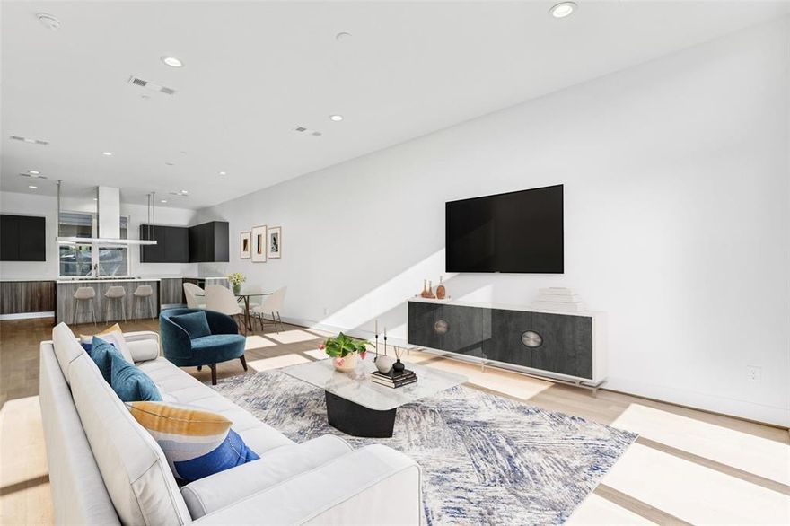 Built by Urban Lofts Townhomes, this home at 3040 Chimes Street offers 2,955 square feet of thoughtfully designed living with 3 bedrooms, 3.5 bathrooms, a private 2 car garage, and a fenced front yard in one of Dallas’s most ideal locations. Hardwood floors and abundant natural light complement a very open floor plan that flows seamlessly across multiple levels, ideal for entertaining and everyday living. The layout includes two spacious living areas and is pre designed to accommodate a future elevator if desired, providing long term flexibility. The kitchen anchors the main living level with stainless steel appliances, a gas cooktop island, built in wine refrigerator, and custom cabinetry. Bedrooms are generously sized with abundant walk in closet space throughout. Outdoor living stands out with a fourth floor rooftop terrace offering expansive views of the downtown skyline, creating an ideal setting for relaxing or entertaining. This townhome offers exceptional space, flexibility, and downtown views in one of Dallas’s most ideal locations.