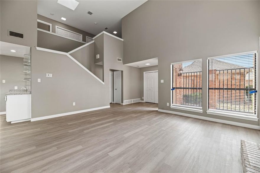 This Meadows West townhouse just had a major price improvement and is now one of the best opportunities in the neighborhood. Step inside to soaring ceilings, great natural light, and an inviting living area with built-ins and a wood-burning fireplace. The updated kitchen features granite counters, stainless appliances, double ovens, a cooktop, island, and a wet bar that makes entertaining easy. Enjoy a private patio right off the kitchen.

Upstairs, the primary suite feels like a retreat with its own balcony, dual vanities, soaking tub, and separate shower. A flexible loft offers space for an office, gym, or reading nook. With a 2-car attached garage, modern updates throughout, and a layout that lives comfortably, this home is ready for its next chapter at an unbeatable new price.