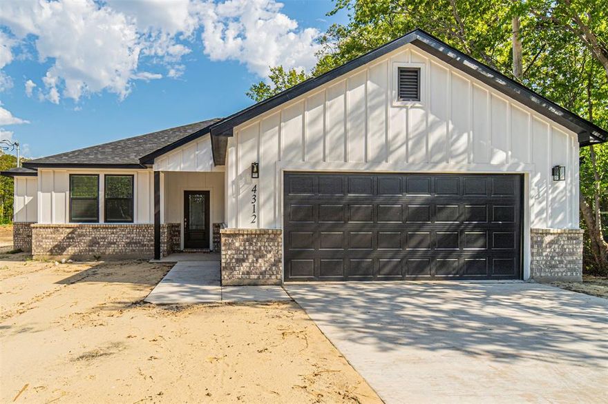 New construction on huge 0.35 acre lot on quiet street. Large kitchen island with stainless appliances, quartz counters and under cabinet lighting. LVP flooring throughout with double vanities in both bathrooms. Mud room area and covered back patio.