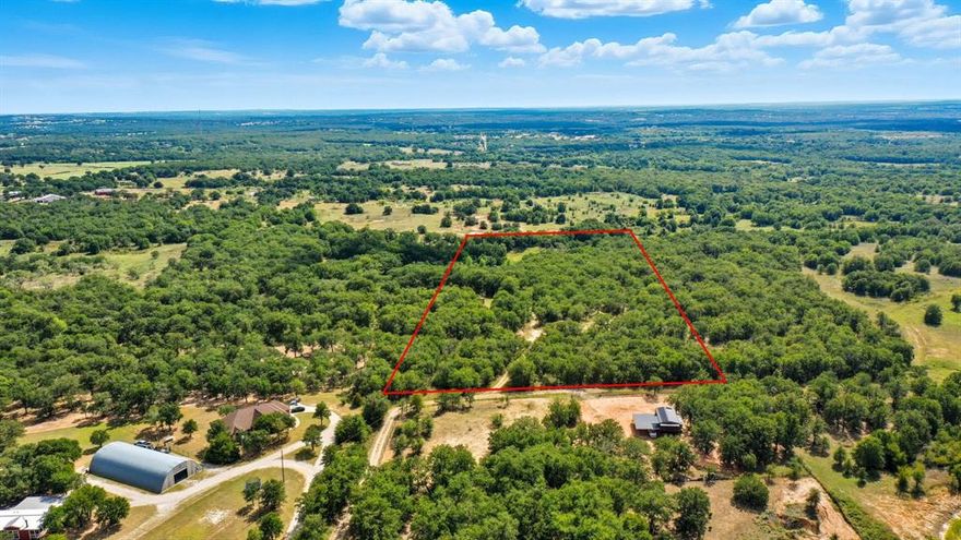 Own your piece of Parker County. This parcel over 12 acres nestled off a private road offers you the privacy you need and the freedom you deserve. Hardwoods, a meandering seasonal creek, a gentle topography, and in the growing heart of Poolville surround by other beautiful ranchettes and homes. This is the place for you and your family to grow roots on.