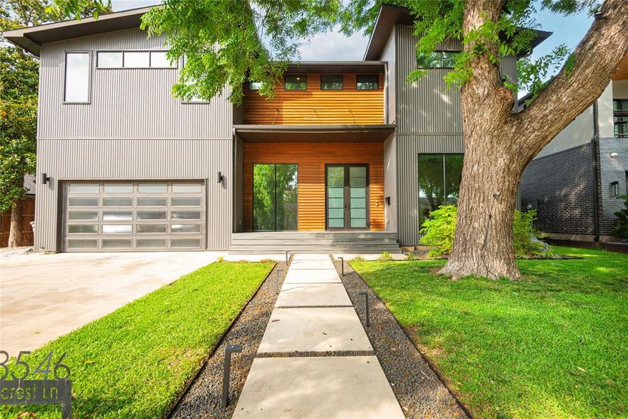 Situated on one of West Bluffview's most adored streets sits 8546 Glencrest Lane.   As you step in, you are greeted in the foyer with breathtaking floor to ceiling windows that illuminate natural light throughout the house. The home features smart home technology, a Wifi eco-friendly thermostat and spray foam insulation throughout to keep the home cool in the summer and warm in the winter. A gourmet chef's kitchen features Bertazzoni appliances, a walk-in pantry and an integrated granite and walnut waterfall island with views facing the expansive dining and living areas. Outside sits the cedar wood patio featuring an incredible indoor and outdoor living experience.  Every corner of this property was thoughtfully designed to entertain, complete with a Bertazzoni wine fridge off the main living area near the wet bar. 

The first level features an ultra private primary suite, nestled away from the living area with high end lighting and fixtures. Three additional bedrooms on the second level, each with their own suite. The second level also features a second living space, upstairs laundry room and a wet bar with a balcony. A rare opportunity to own a 2020 newer construction built home in one of the best neighborhoods Dallas has to offer.
