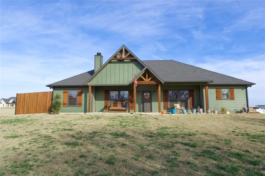 Beautiful custom-built 3-bedroom, 2.5-bath home in Muenster, Texas — one of the most sought-after small towns in North Texas. Located just a few blocks from both Muenster ISD and Sacred Heart Catholic School, this home offers an exceptional location for families seeking top-rated education within walking distance.

Situated in a desirable neighborhood with strong curb appeal, this move-in-ready home features an open-concept floorplan with soaring cathedral ceilings, abundant natural light, and a layout designed for comfortable everyday living and entertaining.

The spacious kitchen includes granite countertops, a large island, pantry, electric cooktop, and ample cabinetry, plus the added benefit of on-demand hot water throughout the home for comfort and efficiency. The kitchen flows seamlessly into the inviting living room anchored by a stunning stone, wood-burning fireplace with natural gas starter, creating a warm and welcoming focal point.

The private primary suite offers a walk-in closet, double vanity, and en-suite bath, while two additional bedrooms provide flexibility for guests, a home office, or hobbies. The thoughtfully designed laundry room is positioned between the garage and the primary suite and includes a shower for added utility — ideal for cleanup after outdoor projects, pets, or busy days.

Additional highlights include:
 • Side-entry garage
 • City water and sewer
 • Natural gas availability
 • High-speed internet access
 • Storage shed for extra space

Located in Muenster, known for its rich German heritage, strong community values, and excellent schools, this home offers the perfect blend of quality construction, prime location, and small-town charm.