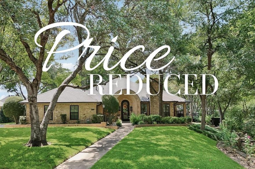 PRICE REDUCED. A fully designer-renovated custom home on a lushly landscaped 0.54-acre creekside lot just 15 minutes from downtown Dallas. Offering rare space and privacy within convenient reach of the Dallas urban core, this thoughtfully reimagined residence sits in Greenbriar Estates, a quiet enclave of custom homes where properties rarely come available. The setting provides large-lot living near the city while remaining close to the region’s major employment centers. The four-bedroom, three-bath home spans approximately 2,844 square feet and includes a detached 224-square-foot studio with infrared sauna, ideal for a home office, wellness space, or creative retreat. Interiors were redesigned with high-end materials and designer finishes throughout, including white oak floors, custom drapery, vintage Murano glass lighting, and fixtures by Kelly Wearstler and Visual Comfort. The kitchen features Miele appliances, Calacatta marble surfaces, and ten-foot ceilings. Marble-clad baths and a serene primary suite include heated floors, a Victoria + Albert soaking tub, Thasos marble, and a Toto bidet. Extensive infrastructure upgrades include dual HVAC systems (2022), updated electrical (2017–2024), Pella windows, new roof and gutters (2022), tankless water heater, a custom steel front door (2021), and a whole-home generator (2023). Outdoor living is designed for both entertaining and relaxation with a renovated pool, limestone decking, greenhouse and garden beds supported by rainwater harvesting, and a finished patio with ambient lighting. With convenient access to Downtown Dallas, Uptown, the Dallas Medical District, and the Las Colinas business district in Irving, this home offers an ideal balance of privacy, space, and proximity for buyers relocating to the Dallas–Fort Worth area or seeking a peaceful setting within commuting distance of the city’s major corporate campuses. This is a rare opportunity to acquire a fully realized home where the vision is complete.