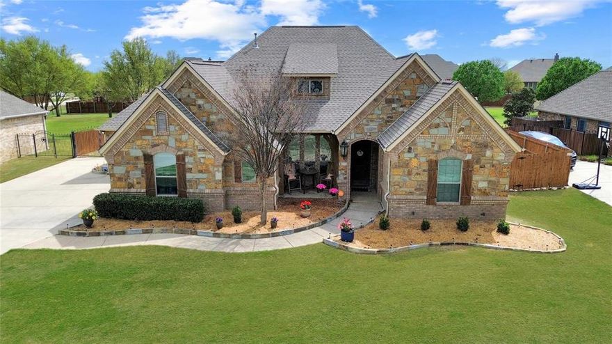 Charming 4-bedroom, 3-bathroom home on a spacious 0.5-acre lot with a large backyard—perfect for entertaining, outdoor living, and future additions. This move-in ready home features a flexible floor plan with a dedicated home office and a generous upstairs bonus room ideal for a game room, media room, or playroom. Interior highlights include a cozy fireplace, updated paint, and custom antiqued cabinets that add warmth and character throughout. The open and functional layout offers abundant natural light and comfortable living spaces. The kitchen is equipped with modern appliances, ample counter space, and plenty of cabinetry—perfect for everyday living and hosting. All bedrooms are generously sized with ample closet space, including a spacious primary suite. Enjoy peaceful living with room to grow, all while being conveniently located near shopping, dining, and top amenities.
