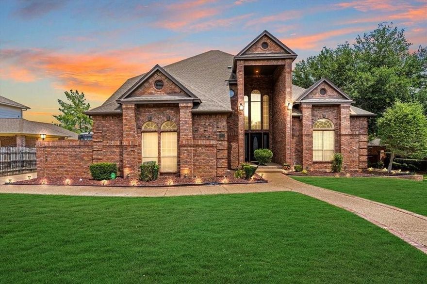 Welcome to the desirable Georgetown community, offering a private pond, walking trail, and playground. This beautifully designed home features an open floor plan that seamlessly blends the living, dining, and kitchen areas, highlighted by soaring 24-foot ceilings, multiple living spaces, and two inviting fireplaces. The chef’s kitchen boasts granite countertops, a spacious center island, stainless steel appliances, and abundant cabinetry. The primary suite is a true retreat with a cozy sitting area, large windows, dual vanities, a jetted tub, and an impressive walk-in closet complete with built-ins and a separate cedar closet. Timeless details throughout the home include wood beams, crown molding, tray ceilings, and recessed lighting.
Step outside to your private backyard oasis with a sparkling pool and covered patio, ideal for both relaxation and entertaining. A wide driveway and three-car garage provide ample parking, including space for an RV. Conveniently located near shopping, dining, entertainment, and with easy freeway access.