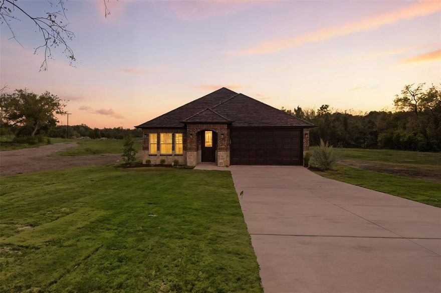 Discover small-town charm in this beautifully finished home set on just over an acre in the growing community of Tom Bean, with convenient access to nearby cities such as Sherman, Anna, and McKinney. Quality craftsmanship is evident throughout, beginning with an open floorplan that welcomes you into a kitchen featuring decorative lighting and a smooth, functional flow into the living and dining areas. The home offers three comfortable bedrooms, including a primary suite with a walk-in closet and separate shower and tub, along with a dedicated office that can easily double as a fourth bedroom. Outside, the expansive lot provides space to build a workshop, create outdoor amenities, or simply enjoy room for pets to roam. Schedule your private showing today to experience the comfort, quality, and potential this property offers.