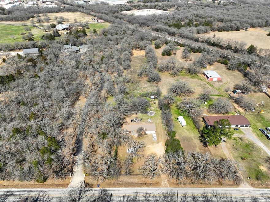 This is a rare find in Mansfield! 1.84 acres with electricity on-site and city water! The property will require a new septic when you build your dream home. The property is currently cross-fenced and ready for its new owners to improve the property back to life! There is a shared water well on the property line that is shared with the neighbor, but the city of Mansfield does provide fresh water to the address. There are no deed restrictions which means you can come build exactly what you want here within city requirements! The property is in Mansfield city limits. Bring your own builder or ask the listing agent for a list of reputable builders in the area. The property is shown by appointment only so contact your agent for a showing! Do not attempt to enter the structure on site as it is unsafe and not livable; it will need to be demolished.