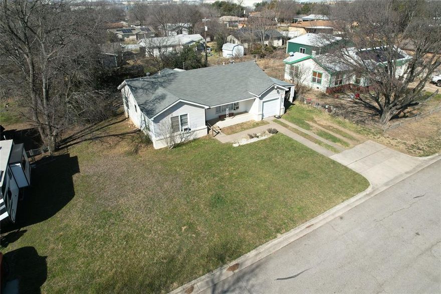 Welcome home to charm and character around every corner! Original hardwood floors flow through most of the home, bringing warmth and timeless appeal.  
One bedroom is truly a child’s dream come true, featuring built-in bunkbeds that can be folded up for even more space to play.  The real excitement is the 2nd floor loft accessible by either a climbing wall or attic stairs. The loft space adds a sense of adventure and imagination and is not included in the listed square footage.  
The kitchen is both functional and inviting, offering open storage, large walk-through pantry, 2nd pantry, breakfast bar and ample room for a dining table, making it ideal for everyday meals and casual gatherings.  
With its unique features, flexible spaces, and classic details, this home blends comfort, creativity, and practicality in a way that’s hard to find. A wonderful opportunity to own a home that feels as special as it is livable.