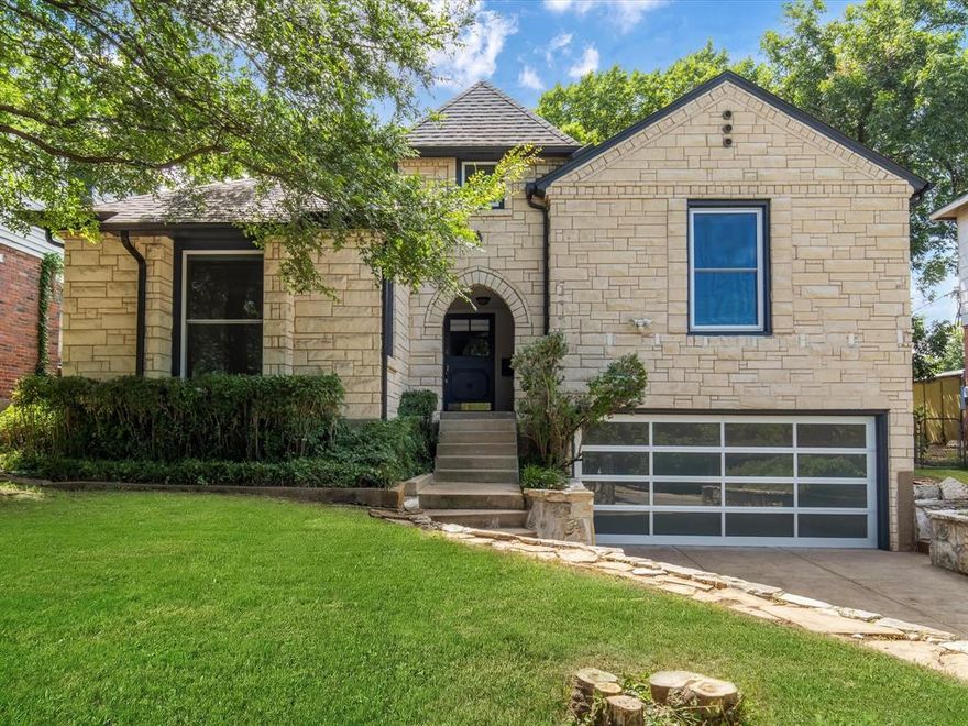 Welcome to 315 N Montreal Avenue, a timeless 1940s Dilbeck-style Austin stone home in the sought-after L.O. Daniels neighborhood of North Oak Cliff. Set on a generous 7,100 sq ft lot, this 3-bedroom, 2-bath home blends vintage architectural charm with modern livability. Original hardwood floors, fresh 2024 interior paint, and abundant natural light flow throughout the unique split-level design. The spacious living room showcases a striking stone fireplace, while the upstairs primary suite offers privacy, vintage tile accents, dual closets, and a flexible bonus space perfect for a nursery, office, or studio. Two additional bedrooms on the lower level share a mid-century tiled bath. The kitchen connects to a cozy sunroom and opens to a lush backyard shaded by mature trees, with both a side deck and back patio ideal for entertaining.

Investor’s Dream or Family Gem: This property comes with two income-producing opportunities in one! The detached tiny home has been a highly successful Airbnb since 2017, consistently generating income as a unique private rental.

The main house is fully staged and set up to host up to 12 guests, perfect for group bookings, families, or traveling professionals.

Whether you’re looking to house hack, expand your portfolio, or enjoy a family home with a built-in income stream, this setup delivers exceptional flexibility and return potential.

Located minutes from Bishop Arts, Coombs Creek Trail, Stevens Park Golf Course, and downtown Dallas, this property combines character, comfort, and unmatched income potential in one move-in-ready package. Zoned to Dallas ISD, including the historic Sunset High School.

Don’t miss this rare Oak Cliff opportunity!! Live, rent, or both!