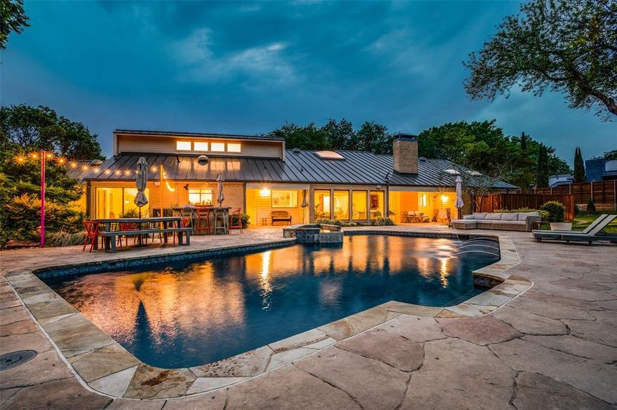 Cool 70's soft contemporary taken to another level by current owners who designed and completed remodeling in 2021. Situated on a rare 0.713 acre Lakewood lot with creek access, beautiful trees and extremely large private landscaped lawn for sports and play, includes huge pool, spa, outdoor shower, kitchen-dining area, pergola with firepit, raised herb garden and deck to watch the wildlife in the creek! 3 bedrooms, 2.1 baths and 2 office spaces-one in a glass-walled loft-one on the main floor are convertible to whatever you envision. The outsized downstairs office-den with abundant windows overlooks the creek and has wall of custom open shelving for books-art-collectibles. Fully remodeled designer en-suite baths, stunning wood accents-shelving thru-out living spaces produce unique aesthetics. In the middle of everything Lakewood, walking distance to the elementary, strolling distance to White Rock Lake.