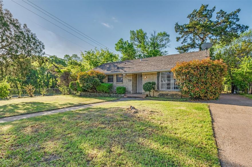 Welcome to this corner lot home featuring 3 bedrooms and 2 bathrooms in a prime, convenient location! This property offers major system updates within the last 7 years, including the roof, water heater, heating furnace, and electrical panel. Step inside to find a flexible floor plan with a front room that can be used as a formal dining area, home office, or second living space. With a large backyard and covered back patio. 
Additional features include a 2-car garage currently used for storage, with the potential to be easily converted back to full use. The home located directly across the street from Kiest Park with walking trails, recreational facilities, soccer fields, tennis courts and a recreation center.