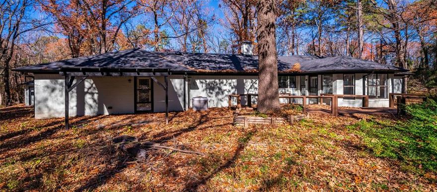 Beautifully updated four bedroom 3 bath home setting on 4.7 acres in a very nice neighborhood just waiting for its new owners. This home is great for a larger family or for a family that needs a mother in law suite. Updates include a new roof on the house, garage and shop, gutters, windows, countertops, bathroom vanities, some flooring and painted inside and out. If you like seclusion then this is the property for you so dont waste any time and come take a look. This home comes with a Lifetime Transferable Warranty on the slab and will provide a Home Warranty. There is no survey so buyer will be responsible if its needed. Seller is willing to Seller Finance with half the money down. Priced way below appraisal value.