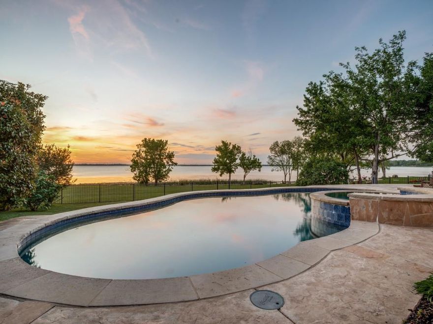 Coveted Lakefront Haven with Breathtaking Sunsets and sensational Lake Ray Hubbard views. Beautifully updated property with a stunning pool and spa. Charming curb appeal and gorgeous landscaping which is just the beginning of this amazing home. The entrance opens up to the updated living room with Trevino Harwood Flooring, Anderson windows, high ceilings, stunning woodburning fireplace and magical sunset views which can be observed through many other vistas! The open floorplan captures the living room, second dining and kitchen. The Gourmet Kitchen has quartz countertops with ss appliances and many more amenities. The formal Dining room is off the entrance and can be used for a study as well. Great utility room off the kitchen with built-ins and a pantry. The Primary bedroom has vaulted ceilings, sitting room with pool and lake views. Also, a well-equipped large Walkin closet. The primary bathroom has double sinks, separate shower and a garden tub. There are three more bedrooms which two of them share a Jack and Jill bathroom. This Breathtaking backyard sanctuary is off the charts. The sensational pool and spa open up to the impressive, landscaped backyard and Lake Ray Hubbard. The showstopper is the Captivating Radiant Sunsets and that is the Gift that keeps on giving! Many more Designer finishes and amenities throughout the property.