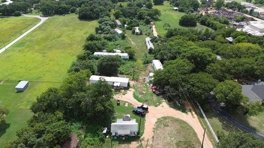 *Seller is offering seller financing for one year with 20% down* Wow! Rare opportunity to own a mobile home park in Rendon. 5 acres with 8 known septic tanks available! Currently, there are only 3 units being utilized on the property.  There is one small house that is no longer being rented but could be renovated and used again. Currently, there is 1 small SFH and 2 mobiles that are leased out. This property has tons of potential for the right buyer and could easily be made into a profitable venture for the right person! Historically high rental rates in the Mansfield ISD zone due to lack of rental inventory! No surveys or written reports available. DO NOT DISTURB TENANTS. Showing by appointment only.