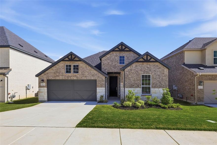 Discover the exquisite charm of the Superb Single-Story Brightland Home, showcasing the Oleander Floor Plan, which boasts an impressive 2,217 sq ft of thoughtfully designed living space. As you enter, you'll be greeted by an entryway adorned with upgraded wood floors and grand 8' doors, creating a captivating first impression and an expansive view that seamlessly flows into the inviting great room. The heart of the home lies in the gourmet kitchen, featuring a full-function island that beckons culinary creativity. With a chef-ready layout complemented by sleek stainless steel appliances, this kitchen is both functional and visually appealing. Enhance your entertaining with the added wet bar, perfectly situated for mixing delightful cocktails or serving beverages to guests. Retreat to the spacious owner's suite, a true sanctuary with a private bath that offers a double vanity, a luxurious soaking tub, and a generous walk-in closet designed for your wardrobe needs. Three additional well-appointed bedrooms and a study are thoughtfully placed in their own sections of the home, providing the perfect balance of privacy and accessibility for family members or guests alike. This home is not just a place to live; it's a harmonious blend of style and practicality, ideal for those who value both elegance and comfort. At Green Oaks Preserve, you'll find a seamless blend of peaceful suburban living with the convenience of urban amenities, making it an ideal place to call home. Residents can take advantage of the nearby Lake Arlington for boating, fishing, and scenic views, plus the luxurious Shady Valley Country Club for golf, dining, and social events. Golf enthusiasts can also enjoy Lake Arlington Golf Course, Waterchase, and Texas Rangers Golf Clubs. Sports fans will love being near AT&T Stadium and Globe Life Field, home to the Dallas Cowboys and Texas Rangers. Families can enjoy the thrills of Six Flags Over Texas and Hurricane Harbor.