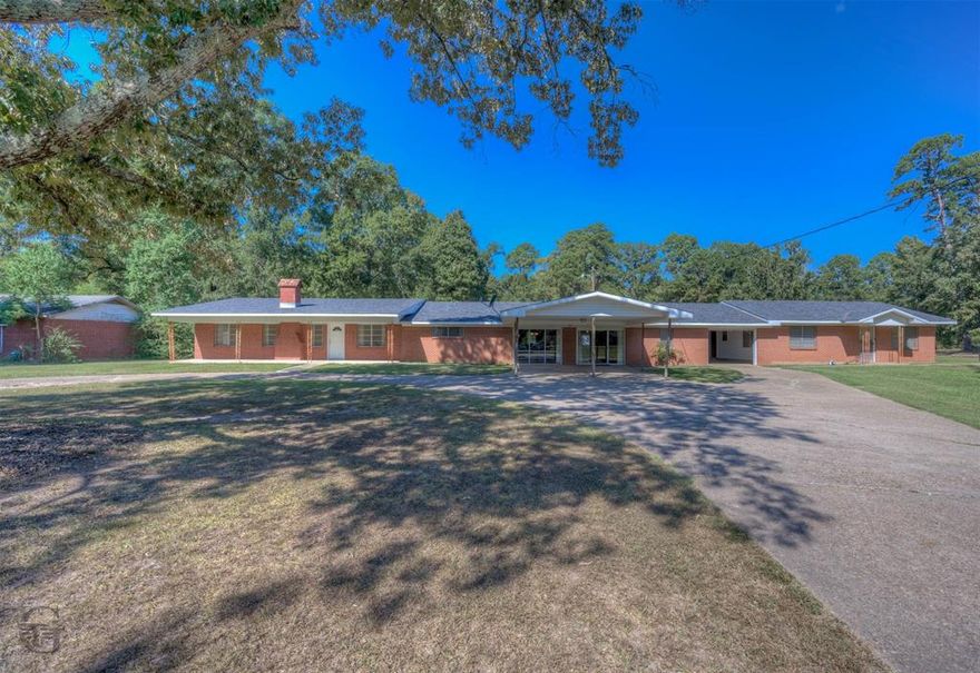 Large family home with an attached mother in law suite. The main home is 2,386 sq ft with 4 bedrooms and 2 full bathrooms. The 2nd home is 1495 sq ft with 2 bedrooms and 2 full baths. The two homes are divided by a garage but are all under one roof. Each home has a screened in back porch. There is a nice metal workshop with electricity and an RV hookup in the back yard. This home has great potential and has been well cared for. Come see it today.