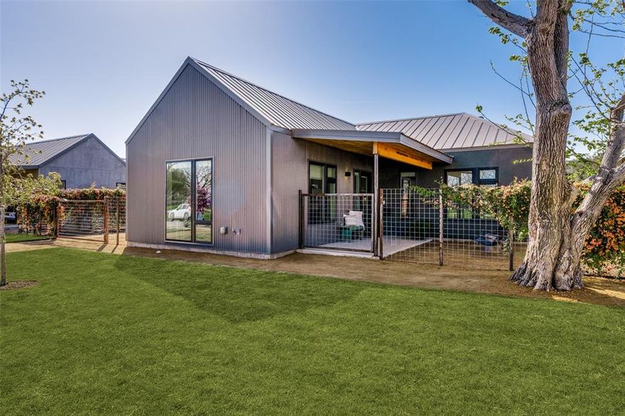 A Texas Modern home designed by Lake Flato Architects. A forward concept with exceptional detail including standing seam metal roof, tankless water heater, large windows, polished concrete floors, private courtyards in front and back. This home is perfect in so many ways from the museum finish walls to the sights of the Dallas Skyline . Oversized front entertaining space with 12 foot high ceilings completely open to the kitchen.  Two spacious bedrooms including primary with ensuite bath. Many custom features include floating shelves in the living area and pendant lighting in kitchen and dining. 
Convenient to Bishop Arts, Sylvan 30.  Great location to access downtown Dallas or the Medical District. This development is known at the 
Haciendas and was named Best Development of 2021 by the Dallas Builders Association.  An impressive home that will delight.