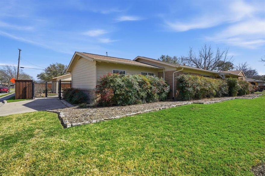 This is one of the most immaculate homes you will tour.  Mid century Sprawling Ranch has over 2100 sq ft of living space situated on an oversize corner lot. Enter the circular dive  through an automated iron gate that leads through the custom carport with storage. The entire property is enclosed by a custom privacy fence.   This private residence has been lovingly cared for by its current owners for over 25 years .   
 New windows and fresh paint complement the the original 1955 Hardwood floors that look like new. Two spacious living areas are great for entertaining. Both bathrooms have been updated to a high standard. Office, storage and laundry room give this house lots of versatile living space .  Newly built Deck overlooks the beautiful landscaped oasis.  The sprinkler system covers front, back and side yard  for easy maintenance.