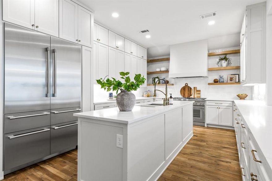 Tucked inside the prestigious, guard-gated Glen Lakes community, this impeccably and completely renovated 4,482 sq ft residence offers refined living in one of Dallas’ most coveted enclaves—just moments from Central Expressway, NorthPark Center, and the city’s premier dining and shopping destinations.
Step inside to soaring 20-foot ceilings and a dramatic, light-filled living area anchored by one of two beautifully appointed fireplaces. Designed for entertaining, the home features two built-in wet bars and a stunning dual-island kitchen with custom cabinetry, designer lighting, and sophisticated wallpaper accents. Throughout the home, curated tilework and exquisite flooring selections further elevate the interiors with subtle yet striking detail.
The spacious primary suite, located on the main level, is a luxurious retreat with a spa-inspired marble and granite bath. Enjoy a freestanding soaking tub, an oversized double walk-through shower, his-and-her water closets, and a couture-worthy custom closet.
Upstairs, a versatile flex space offers endless possibilities—whether as a home office, media room, playroom, or private fitness studio. Three secondary bedrooms, each with sleek, modern en-suite baths, provide comfort and style for family or guests.
Additional highlights include a charming breakfast nook with built-in window seat storage, a well-appointed utility room with custom built-ins, and an epoxy-coated two-car garage. Residents enjoy access to private walking trails and a community pool—all within a secure, lock-and-leave setting in the heart of Dallas.