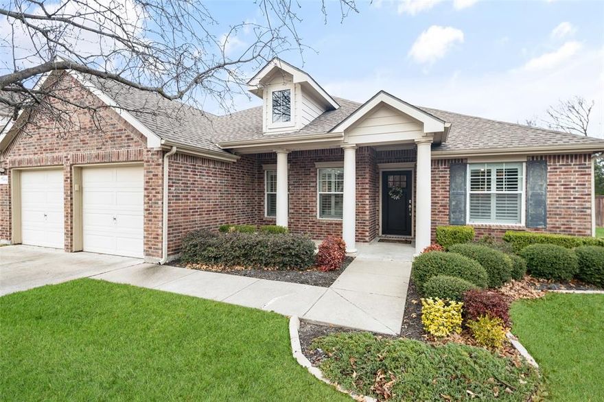 BEAUTIFUL One Story Home set on an oversized serene lot with mature trees and peaceful views, offers the perfect blend of comfort and functionality.  The open floorplan features wide plank wood flooring, plantation shutters and views of the backyard and greenbelt, creating a warm and inviting atmosphere.  The Kitchen features stainless appliances, DCS Fisher and Paykel Gas Range, Microwave, Cabinet pull out drawers, and a seamless flow to the dining and living areas - ideal for entertaining or everyday living.  The primary suite is thoughtfully separated from the secondary bedrooms, and has a view to the backyard.  Primary Bathroom with garden tub, separate shower, dual sinks and walk in closet.  The expansive living room is anchored by a fireplace and offers gorgeous views of the backyard.  Step outside to your private covered patio (12x20) and unwind while enjoying the tranquil greenbelt scenery - a perfect retreat for relaxation, play or gatherings.  Three additional secondary bedrooms provide ample space.  Second bedroom features built ins that would make a perfect home office.  Mud bench next to utility room and entry to garage.  Located south of 380, no MUD or PID tax.  Easy access to McKinney's vibrant entertainment district at HUB121, HEB, Whole Foods, dining and downtown.  Zoned McKinney ISD.