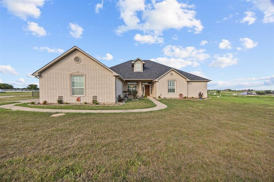 Bring the animals and enjoy peaceful country living! This charming two-story brick home sits on 5 acres, with the option to purchase an additional 7.5 acres next door—offering the opportunity to own up to 12.5 acres or divide it down to as little as 2.5 acres. Whether you’re dreaming of wide-open space, room to expand, or building alongside friends and family, this property makes it possible. Create your own private retreat or multi-home setup.

Inside, the main level features a spacious living area with a cozy gas fireplace, two dining spaces, four bedrooms, and two and a half bathrooms. The light-filled living room opens to a screened-in porch with beautiful views of the surrounding property. 

The private primary suite includes a spacious ensuite bath with dual vanities, a soaking tub, walk-in shower, and a large walk-in closet. Secondary bedrooms offer generous closet space. One of the secondary bedrooms has direct access to a shared bathroom—functioning like an ensuite—making it ideal for guests or older children who prefer more privacy.

Upstairs, a versatile media or flex room with a wet bar is perfect for movie nights, game days, or additional living space. There's also unfinished attic space ready to be finished out if more room is needed.

This home is equipped with a brand-new roof, new HVAC system, central vacuum system, and three HVAC zones for personalized comfort. Enormous closets provide ample storage throughout. Additional highlights include a three-car garage, sprinkler system, fenced dog yard, and included washer, dryer, and refrigerator, making this home truly move-in ready.

Equestrian enthusiasts will appreciate the three-stall barn, complete with water and electric, a wash rack, tack room, office space, and covered parking for an RV or equipment. With everything in place, this property is ready for you to fully enjoy the country lifestyle.