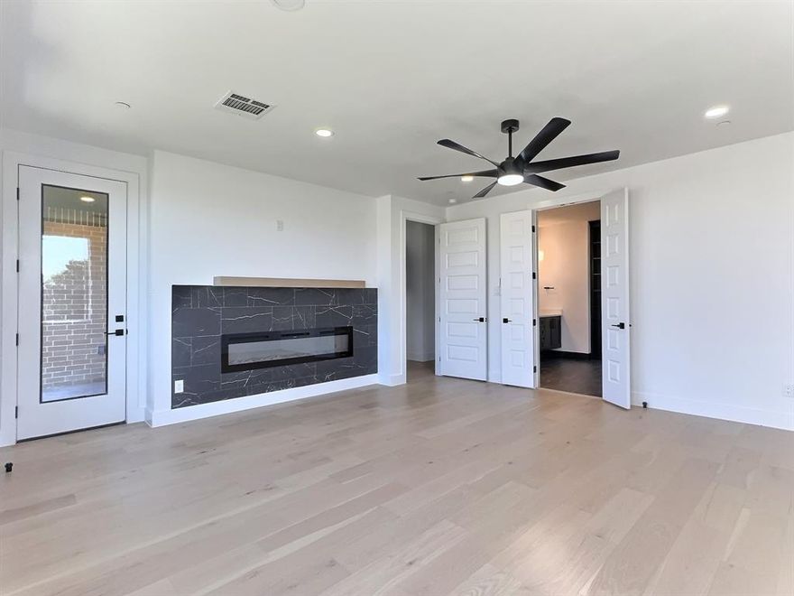 Don’t miss this exceptional opportunity to own a sophisticated three-story townhome perfectly positioned on the waterfront with panoramic views of the Fort Worth skyline and the Trinity River. This elegant residence offers 3 spacious bedrooms, 4.5 luxurious baths, and an open-concept floor plan filled with radiant natural light that enhances the modern, airy ambiance throughout. Contemporary finishes and thoughtful design details elevate every room. The living area and third-floor primary suite each feature a striking color-changing fireplace, creating the perfect atmosphere for both relaxation and entertaining. The expansive owner’s suite also offers breathtaking views—ideal for morning coffee on the covered balcony or evening stargazing. Additional highlights include a three car garage with extra storage and Wi-Fi capability for secure Amazon deliveries, a tankless water heater, and individual high-efficiency HVAC systems on each floor to maximize comfort and energy savings. Elevator-ready with space allocated for future installation. Located in an exciting, up-and-coming neighborhood, this townhome is not only a beautiful place to live but a smart investment for the future. Multiple units for sale. Schedule your private tour today—this is a rare gem!