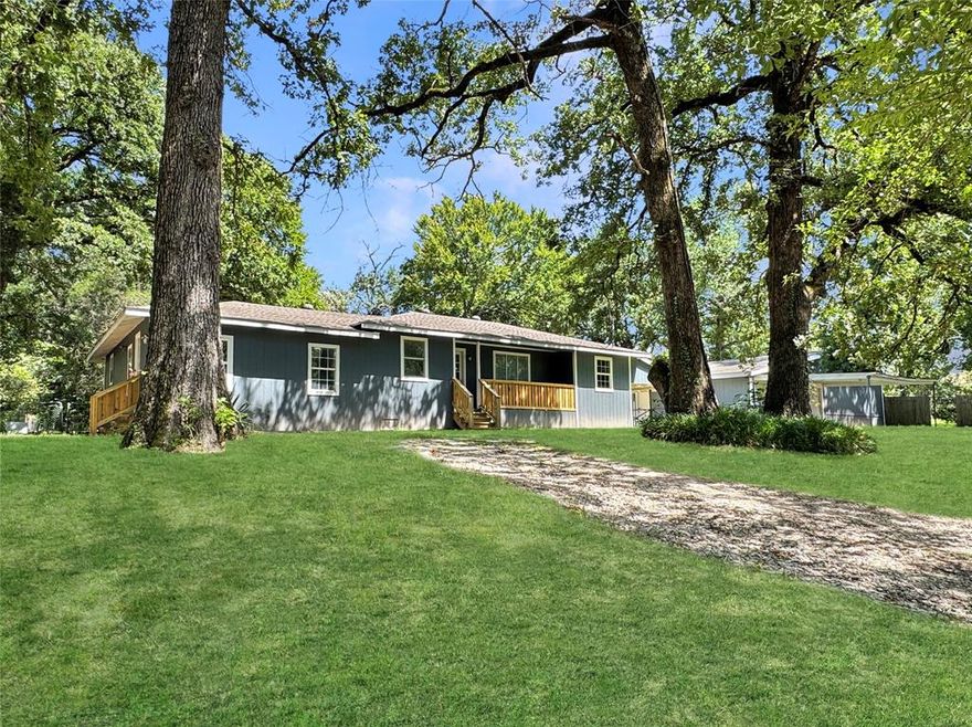 Estate Sale! Discover this unique opportunity in the Westwood Beach community. Just a short walk at the end of the street to the lakefront POA park, 1.5 mile to new Tool City Park, 4 miles to Brookshires Grocery store and 15 mins to Walmart, this spacious property offers the perfect blend of privacy and convenience. Recently updated with fresh paint, laminate flooring throughout, new kitchen cabinets, and updated bathrooms this home is ready for a new owner! Great spaces for entertaining with 2 living areas, bar area in the second living space. Enjoy peaceful outdoor living on the covered patio and deck with no view of neighbors in sight. Don’t miss this versatile and value-packed lake area property!