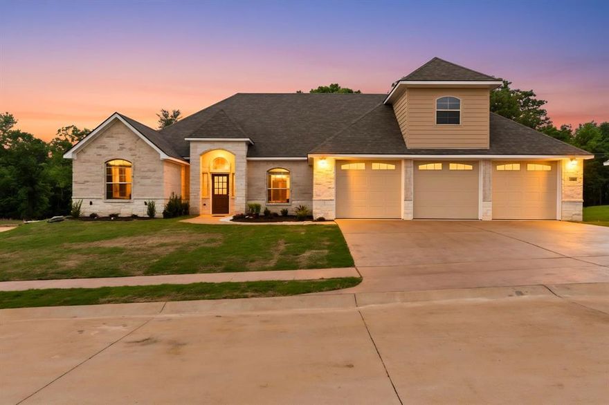 Welcome to this stunning new construction home located in the desirable Corrigan Trails community in Lindale, Texas. Offering 4 bedrooms, 4 bathrooms, and approximately 3,327 square feet of thoughtfully designed living space, this contemporary one-story home blends comfort, style, and functionality. The exterior showcases an attractive brick and stone façade that sets the tone for the quality found throughout the home. Inside, the spacious layout features a split master bedroom design, creating privacy and a relaxing retreat. A formal dining area and bright breakfast room provide multiple spaces for gathering and entertaining. The modern kitchen is equipped with gas cooking, a pantry, and generous workspace, making it perfect for everyday living or hosting guests.
