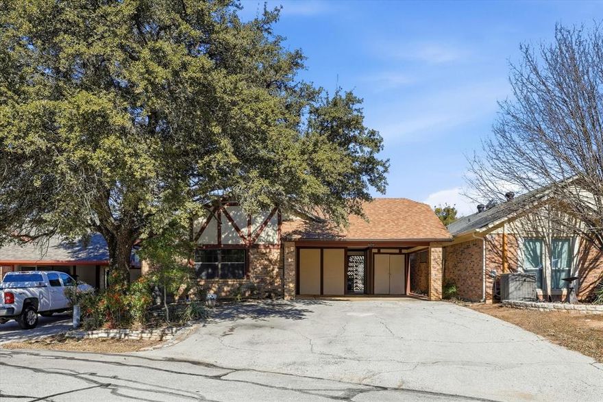 LOCATION • CHARM • AMENITIES GALORE! Enjoy the lifestyle of golf-course living on the 18th fairway of Pecan Plantation, one of Granbury’s most desirable guard-gated communities. Residents enjoy an exceptional array of country club amenities including championship golf, tennis, pickleball, fishing, access to the historic Brazos River, boat ramp, marina, clubhouse, community dock, swimming pool, fitness facilities, horse stables, jogging and bike paths, RV parking, and community campgrounds—all within a beautifully maintained, secure setting. This 2-bedroom, 2-bath Tezcuco Court home, situated on a quiet cul-de-sac, features a split-bedroom floor plan with an open living and dining area that opens to a garden patio overlooking the fairway. The patio provides a peaceful space to relax, entertain, or enjoy morning coffee while taking in the golf-course setting with exceptional views. The 2 car carport also includes an enclosed golf cart storage area with access straight to the fairway. New Roof + Gutters installed 2024.  Lennox Condenser-Outside Unit installed April 2025.  Indoor unit-Trane installed 2017 and serviced 2X annually by Daffan.  Refrigerator will convey.  The home’s style reflects its era, offering an excellent opportunity to update and personalize at your own pace.  Carpet has been removed, and a $ 1,500 flooring allowance is provided by Seller, giving buyers the flexibility to choose finishes that match their taste. Pricing reflects the update opportunity while highlighting the exceptional location and setting. Designed for low-maintenance living, this home is well suited for full-time residence or a lock-and-leave lifestyle. Located just a short distance from the Pecan Plantation Clubhouse, this home offers a rare combination of fairway frontage, amenities, security, and value. CALL TODAY to schedule your showing!