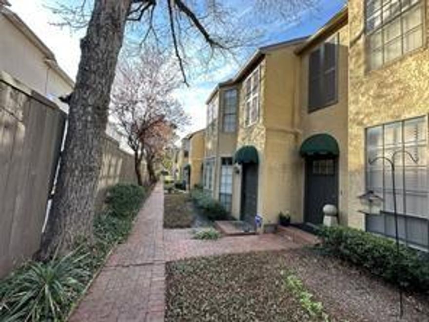 It is exciting to share the details about a fantastic two-bedroom, one-and-a-half-bath condo recently renovated.  his condo is located in a highly walkable neighborhood, offering a low-maintenance lifestyle close to the West Village restaurants and shops, Cole Park, the Katy Trail, and Trader Joe's. The functional floor plan features a spacious living room, kitchen, dining area and an updated half bath with stylish Porcelanosa tile on the first floor. A private patio with French doors will provide an excellent space for entertaining. Upstairs, the two generous bedrooms are perfect for roommates or for setting up a private home office. The unit also has updated flooring, fresh paint throughout, and a refreshed kitchen with stainless steel appliances. Plus, you'll enjoy the convenience of two assigned parking spaces just a short distance from your door. This property offers an incredible opportunity to live in a vibrant area with all the modern comforts.