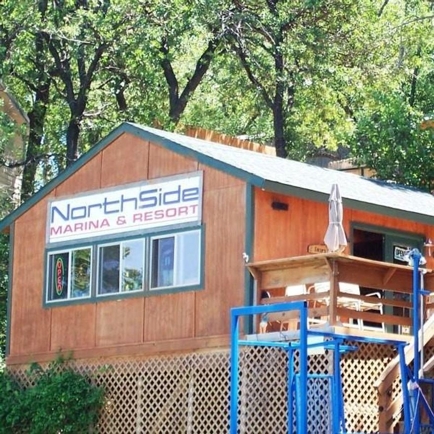 This lakefront resort on over 4.5 acres at Lake Bridgeport, just 50 miles from Fort Worth, offers a rare combination of prime land value and income-producing amenities. The property features 10 cabins and lake houses, two boat docks with 24 slips, a fueling station, RV sites, a full restaurant and bar with a commercial kitchen, and a mini golf course, attracting visitors from across Texas and neighboring states for family getaways on the lake. Renowned for its excellent fishing and year-round recreational activities, the resort generates consistent, diversified revenue streams while offering strong long-term appreciation potential—ideal for those seeking a lifestyle investment or redevelopment opportunity in a high-demand lakefront market. Perfect for expanding a cabin rental business or transforming into a charming Tiny Home or Glamping resort community. Multiple Property IDs will be included. Multiple financing options available, including an assumable SBA loan at a low interest rate and additional seller financing opportunities—creating a rare opportunity for a savvy investor. Contact ANA Brokers for more details.