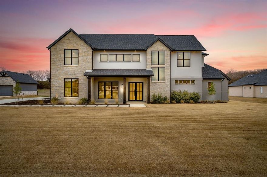 Exceptional custom-built home tucked inside the prestigious gated community of Rolling Creek Ranch. Perfectly positioned on 1.010 acres just moments from the shores of Lake Granbury, this 3,962-square-foot residence offers refined elegance, thoughtful design, and the tranquility of upscale lake-area living. With 4 bedrooms and 4.5 bathrooms, the home balances spaciousness with thoughtful functionality.

From the moment you step through the iron double doors you’re welcomed with rich hardwood floors, soaring ceilings, and expansive windows set the tone for elevated comfort and timeless sophistication. 

Natural light pours into the open-concept living spaces, highlighting the custom craftsmanship details found throughout the home.
The grand living area seamlessly connects to a beautifully appointed gourmet kitchen designed for everyday luxury and effortless entertaining. Custom cabinetry, generous prep space, and an intuitive layout create a space where gatherings feel grand and intimate. Kitchen is open to the living and dining area with flexible bonus spaces. 

The primary suite offers serene views of the property and a spa-inspired bath designed for relaxation,  
A secondary bedroom with full bath and private study are also down stairs. Up the statement staircase you’ll find 2 additional bedrooms, 2 full bathroom, and a bonus area. Step outside through the 2 sets of double doors leading to your outback entertaining area. The expansive covered patio is anchored by a stunning outdoor gas burning fireplace — the perfect setting for cool evenings.

The 1.010-acre lot provides ample space to design a resort-style pool, outdoor kitchen, or garden oasis, all while enjoying the privacy and exclusivity of a gated community.

Located just minutes from historic downtown Granbury and lake recreation. A statement of craftsmanship, comfort, and elevated living near Lake Granbury.