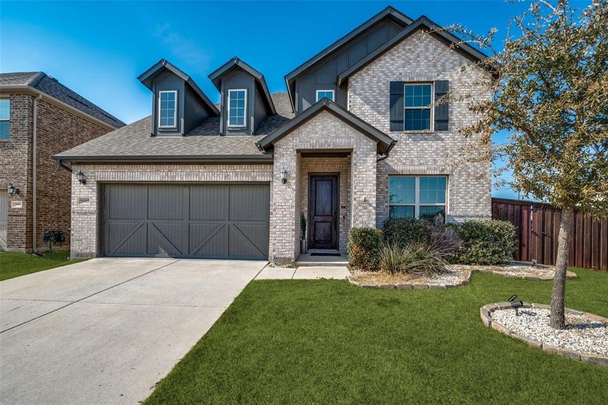 Now available, this thoughtfully designed 4-bedroom, 3.5-bath, East facing home offers 2,802 sq ft of comfortable living with space to work, relax, and entertain.  The main level features a dedicated office and an open-concept layout where the kitchen, dining, and living areas flow seamlessly together.  A dry bar off the dining area adds ideal serving and entertaining space.
The primary suite is located on the main floor and features a spa-style ensuite bath, creating a peaceful retreat.  Upstairs includes a versatile game room or second living area and three additional bedrooms, one with a private ensuite bath.  All bedrooms offer walk-in closets with ample storage.
Enjoy the warmth of the living room fireplace, perfect for cozy evenings. Outdoors, the pergola-covered patio, spacious backyard, and storage shed sit on a desirable corner lot.
Community amenities include a clubhouse, pool with splash pad, pickleball court, playgrounds, walking trails, and event space. Located in the growing Celina–Frisco–Prosper corridor, just minutes from the PGA Omni, with convenient access to dining, retail, entertainment, and highly rated schools.