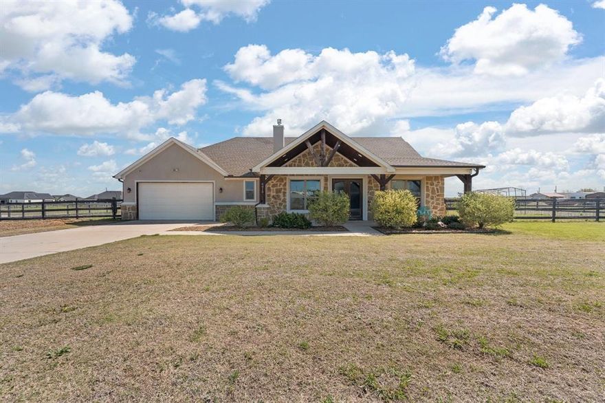 Tucked away on a serene, tree-lined lot just over 1 acre, this picturesque ranch-style home welcomes you with expansive oversized porches spanning both the front and back. Imagine sipping your morning coffee on the front porch as gentle breezes drift through, or gathering with family and friends around the stunning stone fireplace on the spacious back porch. The perfect setting for starry nights, laughter, and unforgettable memories.
Outside, resort-style living awaits! Cool off in the above-ground pool during warm Texas days, grow your own fresh produce in the productive greenhouse, and tend to thriving gardens that bring beauty and bounty right to your doorstep. Best of all, the fully paid-off solar system (which the seller will cover at closing) ensures lower energy bills and true self-sufficiency from day one.
Step inside and be captivated by the grand, open-concept living space. Towering cathedral ceilings with rich wooden beams create a warm, spacious feel, while beautiful built-in shelving frames the fireplace. Luxurious marble flooring flows throughout, complemented by elegant granite countertops in the kitchen, blending rustic charm with modern comfort.
This is more than just a home, it’s a peaceful sanctuary where luxury meets country tranquility. If you’ve been dreaming of a quiet, self-sufficient lifestyle surrounded by nature, this is the one you’ve been waiting for.