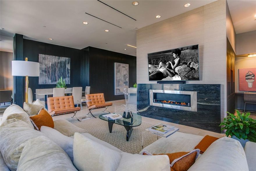 One of a kind custom floor plan at the iconic Lionel Morrison designed One Arts. This 19th floor unit has been recently updated to include custom Philip Jeffreys wallpapers and carpet in the main bedroom.  Walk in closet with electric shoe carousel plus a  spa bathroom with a Toto electric toilet. Second bedroom with custom metal and glass sound proof door. Walls of dark walnut exotic wood and Zebra wood custom Bulthaup kitchen with  an island in marble and stainless steel and matching dining table to convey with sale. Custom lighting and working fireplace and a separate office area plus a large outside patio with storage  make this a sophisticated elegant  home.. A must see.