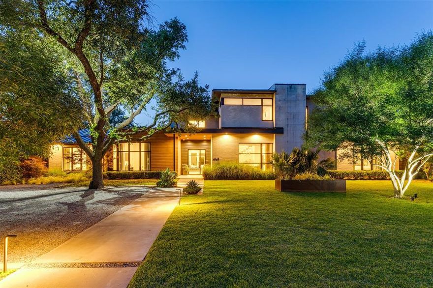 Set on over half an acre of beautifully landscaped grounds, this striking transitional home offers the perfect blend of sophisticated design and effortless comfort. The thoughtfully designed layout is both elegant and livable, featuring a luxurious primary suite and two additional guest suites on the first floor— a rare configuration made possible only on an oversized lot.  Upon entering the two story foyer, one's eyes are drawn to the wall of floor to ceiling windows and sliding glass doors opening on to 1,500 square feet of outdoor covered living space with a gorgeous pool, spa, and manicured yard.  
Additional highlights include an elegant dining room, private office, and flexible spaces tailored to a variety of lifestyle needs.