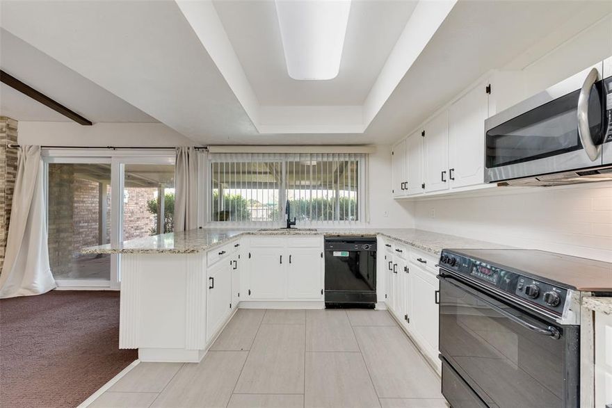 $3,500 seller-paid flooring allowance.
Beautifully remodeled home that backs directly to the park with 3 bedrooms, 2 full baths, 2 living areas, and an open floor plan (Washer, Dryer, and Fridge included). Updated kitchen features granite countertops, tile backsplash, modern lighting, and large windows with park and backyard views. The main living area offers vaulted ceilings with Spanish-style beams, a redesigned fireplace, and sliding doors to a covered patio. All-electric home with new energy-efficient HVAC, newer roof, and new water heater. Fully renovated bathrooms and spacious bedrooms; the primary suite includes hardwood floors, a walk-in closet, and a private bath. New energy-efficient windows throughout. Oversized 2-car garage fits large trucks. Backyard opens directly to the park with trails, tennis courts, a dog park, a playground, and more. Quiet neighborhood with mature trees. Move-in ready