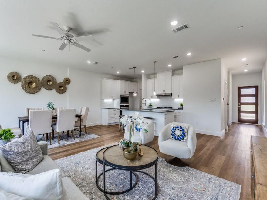 **4.99% 30Year Fixed Rate with approval through Builders Lender**COMPLETED NEW CONSTRUCTION CORNER UNIT!~UPGRADED~MODERN spacious & airy, FLOOR PLAN B boasts an open-style living, kitchen & dining w~plenty of room for entertaining. Kitchen offers DOUBLE pantries, stainless steel appliances w~a gas range, vent hood, & built in microwave. 2nd floor offers 2 guest bedrooms with walk in closets, a shared full bath, and a walk-in laundry room. The large master suite features TWO walk-in closets, a spacious bathroom w~dual vanities, stand alone shower, & garden tub! To complete this floor plan includes a 2 car garage, BALCONY off the 2nd floor Master & PATIO off the living area to include a 6' privacy fence! PRIME location w~quick access to 121 & the DNT & 0.4Miles from The Colony Aquatic Park & Bill Allen Memorial Park! FRONT & BACK lawn care included in HOA!