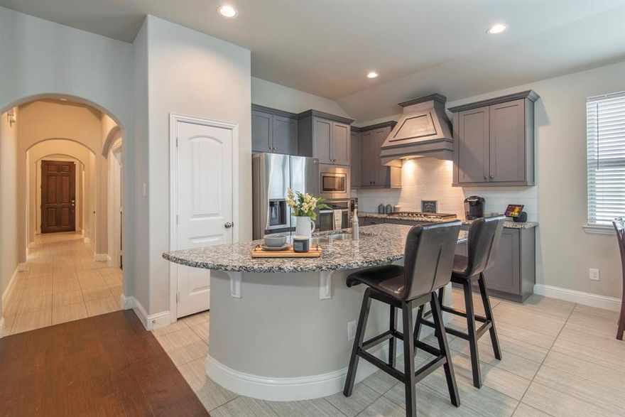 Nestled in the charming Azalea Village at Savannah, this Craftsman home epitomizes modern comfort and style. Move-in ready, it boasts a seamless blend of modern tile and flowing wood flooring throughout, creating an inviting ambiance. The spacious kitchen, a focal point for entertaining, features a gas stove, an island for both prepping and casual dining. Adjacent to the kitchen, the morning room provides a cozy retreat for your morning coffee or a relaxing evening beverage. Designed for versatility, this home includes a study—ideal for a home office or as a flexible space to suit your needs. Whether working from home or transforming it into a creative haven, the possibilities are endless. With meticulous attention to detail, every corner of this home reflects quality craftsmanship and thoughtful design. Discover a residence where contemporary conveniences meet the warmth of a Craftsman aesthetic. Schedule your private showing today.