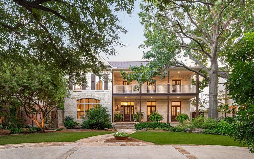 Situated in the heart of the University Park Fairway, this exceptional traditional showplace sits gracefully on an expansive 70x173 lot with a circular drive and commanding stone façade—offering a rare blend of timeless elegance, modern comfort and effortless entertaining. Reimagined by Bernbaum Magadini in 2015 & thoughtfully updated since 2021, the home boasts refined interiors with state-of-the-art amenities, soaring ceilings, wide-plank hardwoods, sound system speakers and abundant natural light throughout. Behind its welcoming front porch and balcony, a gracious center hall introduces chic, light-filled spaces, flanked by oversized formal living and dining rooms that set the tone for sophisticated entertaining. The heart of the home is an impressive chef’s kitchen with Taj Mahal quartzite counters, premier stainless appliances—SubZero, Dacor, Bosch & KitchenAid—a large island, breakfast area, leathered granite wet bar and seamless flow into an oversized great room anchored by a floor-to-ceiling stone fireplace, built-in bookcases, exposed wood beams and sliding doors that bring the outdoors in. A private office and stylish mudroom—with Taj Mahal counters and an oversized wine fridge—complete the main floor. Upstairs, a spacious game room offers the perfect retreat, while the primary suite is a serene escape—featuring a pop-up tray ceiling, sitting area, and spa-inspired limestone bath offering dual vanities and walk-in closets plus a walk-in shower with soaking tub. Four additional ensuite guest rooms offer generous proportions, handsome hardwoods, large closets & stylish baths. Outdoors, the resort-style backyard oasis invites year-round enjoyment with a screened-in covered patio and built-in grill, expansive flagstone terrace with stone fireplace and a sparkling pool and spa with waterfalls. An attached air-conditioned oversized two-car garage has epoxy flooring and extensive built-in storage. All just blocks from Hyer Elementary, Smith Park & Preston Center.