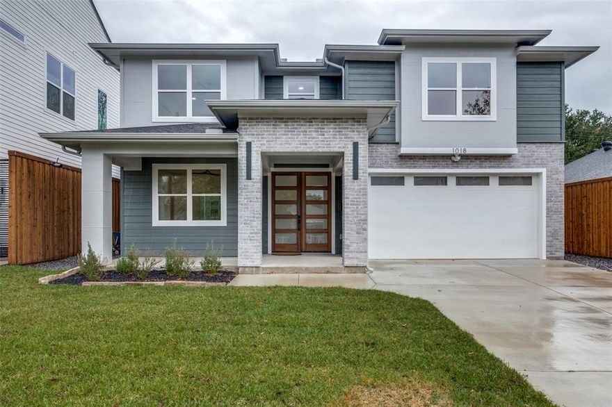 Large covered front porch flows past double front doors into a spacious foyer in this just completed new construction * Flooded with natural light * Luxury Vinyl Plank flooring throughout (no carpet) * Kitchen comes with an abundance of cabinets, ice maker, over-sized gas range with ovens, two pull-out drawers for garbage & recycling and walk-in pantry * One bedroom down and four bedrooms up - downstairs bedroom with ensuite bath and walk-in closet is perfect for a home office * Hidden storage room behind bookshelves downstairs has pre-wired, built-in components for the speakers throughout the home * Living room has an over-sized fireplace wall with wiring for a flat screen TV * Abundance of windows along the backside of the first floor overlook a large patio and synthetic turf yard with three recently planted trees * Wide open staircase in the middle of the home takes you upstairs to the four additional bedrooms, bonus room-den & laundry room with sink * Primary bedroom has vaulted ceilings, two walk-in closets, large free-standing tub & oversized shower * Come see for yourself and make this your new home!