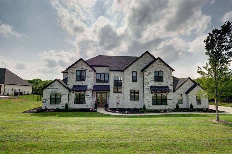 Stunning custom home on acre lot built by Our Country Homes in the gated Montalcino Estates. Enter this home to soaring ceilings, large family room, custom fireplace & great views of the backyard & pool. Open floor plan with custom hardwood floors, lots of natural light & designer touches throughout.The gourmet kitchen is a chef's delight & includes top of the line Wolf appliances, oversized island, lots of cabinet space & walk in pantry. The master suite is spacious & offers spectacular views of the backyard & pool. Downstairs includes a secondary bedroom, home office, flex room perfect for a gym & expanded laundry room. Upstairs offers two additional large bedrooms, game room & separate media room. Spacious outdoor covered patio with outdoor kitchen & stone fireplace is the perfect place for entertaining. The backyard oasis features large mature trees, a spectacular pool & spa along with large expansive grass area. Oversized 4 car garage. This home has it all and won't last long.