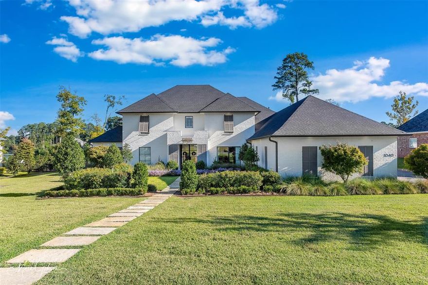 Sited on South Shreveport’s most beautiful recreational lake, this recently-built custom home is available for purchase. Long Lake is known for its natural beauty and wildlife, and residents with rare waterfront homes enjoy its tranquil views and the privilege of direct access to kayak, fish, paddleboard and explore its shores. With over 150’ of lake frontage, 1040 West Pointe Loop offers countless amenities – heated infinity swimming pool, screened-in outdoor porch with kitchen and wood-burning fireplace, the perfect place to spend time outside with family and friends. Accented by antique pine beams and luxury finishes, the main living area (Living Room, Breakfast, Kitchen) have spectacular views of the lake. Notable Kitchen features are double islands, commercial-grade appliances including side-by-side refrigerator freezer, custom hood vent, full-size gas range, designer tile backsplashes, quartzite countertops, and walk-in pantry. The formal Dining Room is cool and modern, with oversized pendants and ample wall space for art. The downstairs Master Suite features walk-through floor-to-ceiling tiled shower, free-standing tub, His and Hers separate vanities and linen cabinets, and an incredibly well-organized and sizable Master Closet. Other downstairs spaces are Bedroom 2 with private en-suite and walk-in closet; Home Office with floor-to-ceiling built-in cabinety; large Utility room with ample storage; under-the-stair reading nook; stunning Foyer with lantern lighting and exposed custom iron stair; Mud Hall with lockers and mud bench. Upstairs, 3 bedrooms, 2 Jack-and-Jill baths, an enormous Game Room, and a Craft or Homework Room lend boundless space for children and guests. This home is a must-see for those looking for a large home that has everything you could ask for in terms of space and amenities.