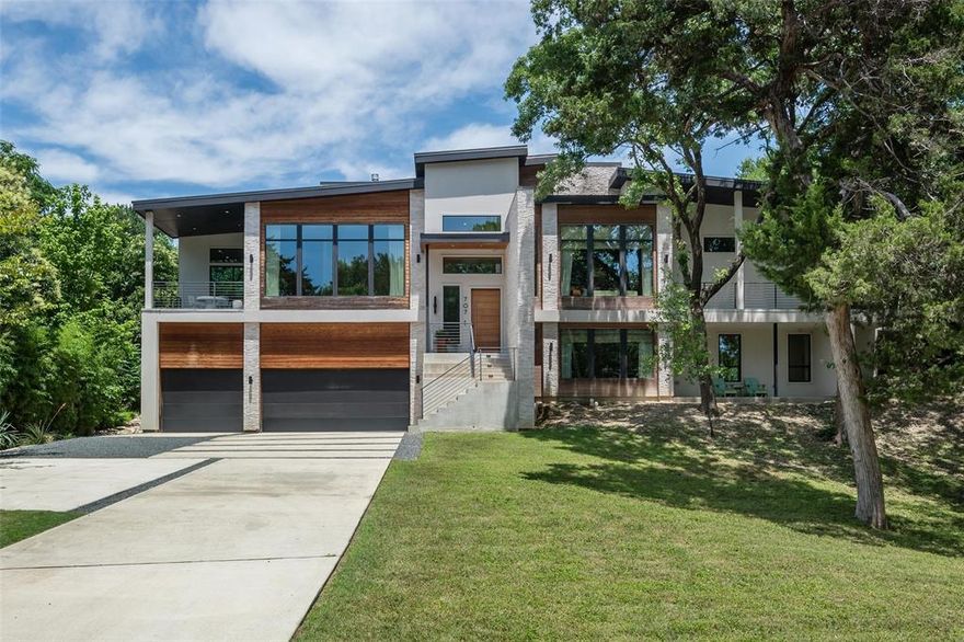 Set atop the hills of East Kessler, this contemporary home boasts treetop vistas throughout. The thoughtful open floor plan provides ample space for entertaining with soaring ceilings, abundant natural light, and walls of sliding doors ideal for indoor-outdoor living. On the main level, the primary living area opens to the kitchen and formal dining room in addition to offering a private office-library complete with built-ins. The primary
bedroom as well as 2 secondary bedrooms are also located on the main level along with multiple covered porches, each with private and secluded views. The lower level offers an additional living area complete with a wet bar, projector and screen, ideal for movie nights. Just beyond is a large, private guest suite complete with full bath. The turfed backyard is outfitted with a stunning pool and spa as well as ample yard space. Room measurements and school details to be verified by Buyer.