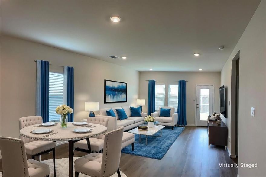 Don't miss this beautiful home on a quiet corner lot in popular Magnolia! The open concept floor plan in this home features a private primary bedroom with en-suite, and a walk-in closet on the lower level! Home has 2 living areas, including a good sized game room, three bedrooms, and a full bath on the second floor. There's wood-look laminate flooring in living, dining, and all wet areas; carpet in gameroom and all bedrooms. All appliances are provided in this all-electric cozy kitchen, including a stainless steel refrigerator and full size washer and dryer. There's a guest bath and a spacious utility room off the kitchen on the first floor. Outdoors, home has a small covered porch, a covered patio and a spacious backyard for year-round enjoyment of the outdoors! Community amenities include a community pool, fishing ponds, and walking trails! Great location in the final phase of this community in Josephine provides ample overflow parking on closed side street and tranquil views of farmland and green pastures! This delightful home is truly move-in ready!