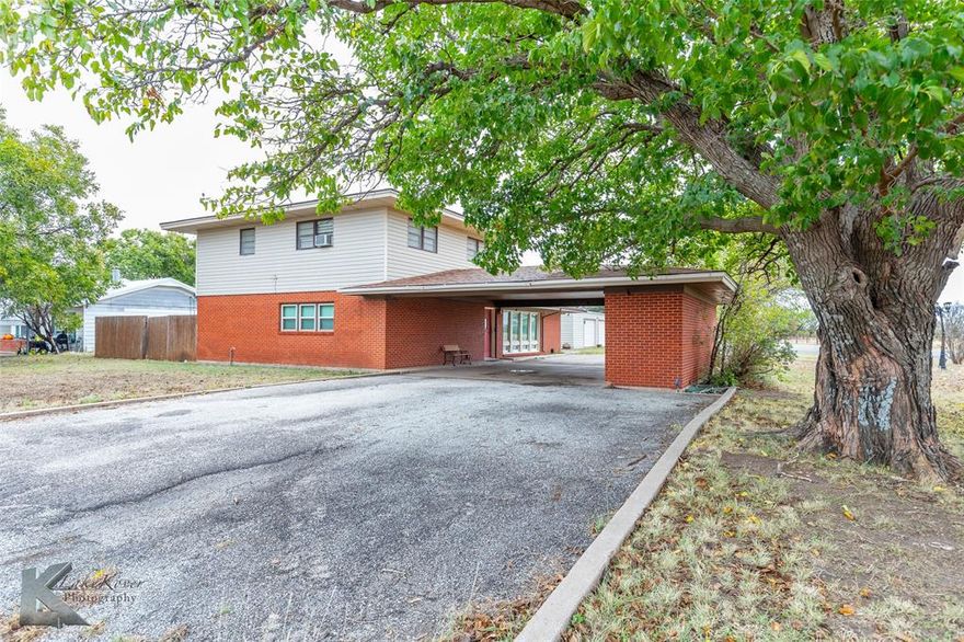 Welcome to this spacious and inviting four-bedroom, three-bathroom traditional two-story home situated on a desirable corner lot in Hamlin, Texas. Offering 2,744 square feet of comfortable living space, this residence perfectly blends small-town charm with generous room to spread out.
Inside, you'll find two living areas that provide the flexibility for both relaxed family time and more formal entertaining. The cozy fireplace ser as a beautiful focal point,creating  a warm and welcoming atmosphere during cold Texas evenings. With two dining area, there’s plenty of space to host family dinners, holiday gatherings, or casual brunches with friends. 
Step outside to enjoy a private patio and fenced yard, perfect for outdoor dining, gardening, or simply soaking up the quiet surroundings. A covered carport offers convenient parking and protection from the elements.
Located in the heart of Hamlin, this home captures the essence of small-town living - friendly neighbors, peaceful streets, and a strong sense of community. Whether you're looking for room to grow or a place to settle down and enjoy a slowe. V ce, this home
Located in the heart of Hamlin, this home captures the essence of small-town living — friendly neighbors, peaceful streets, and a strong sense of community. Whether you're looking for room to grow or a place to settle down and enjoy a slower pace, this home offers the space, comfort, and charm you've been searching for.